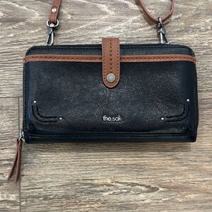 The Sak Large Smartphone Crossbody and Wristlet Leather Wallet Black and Brown